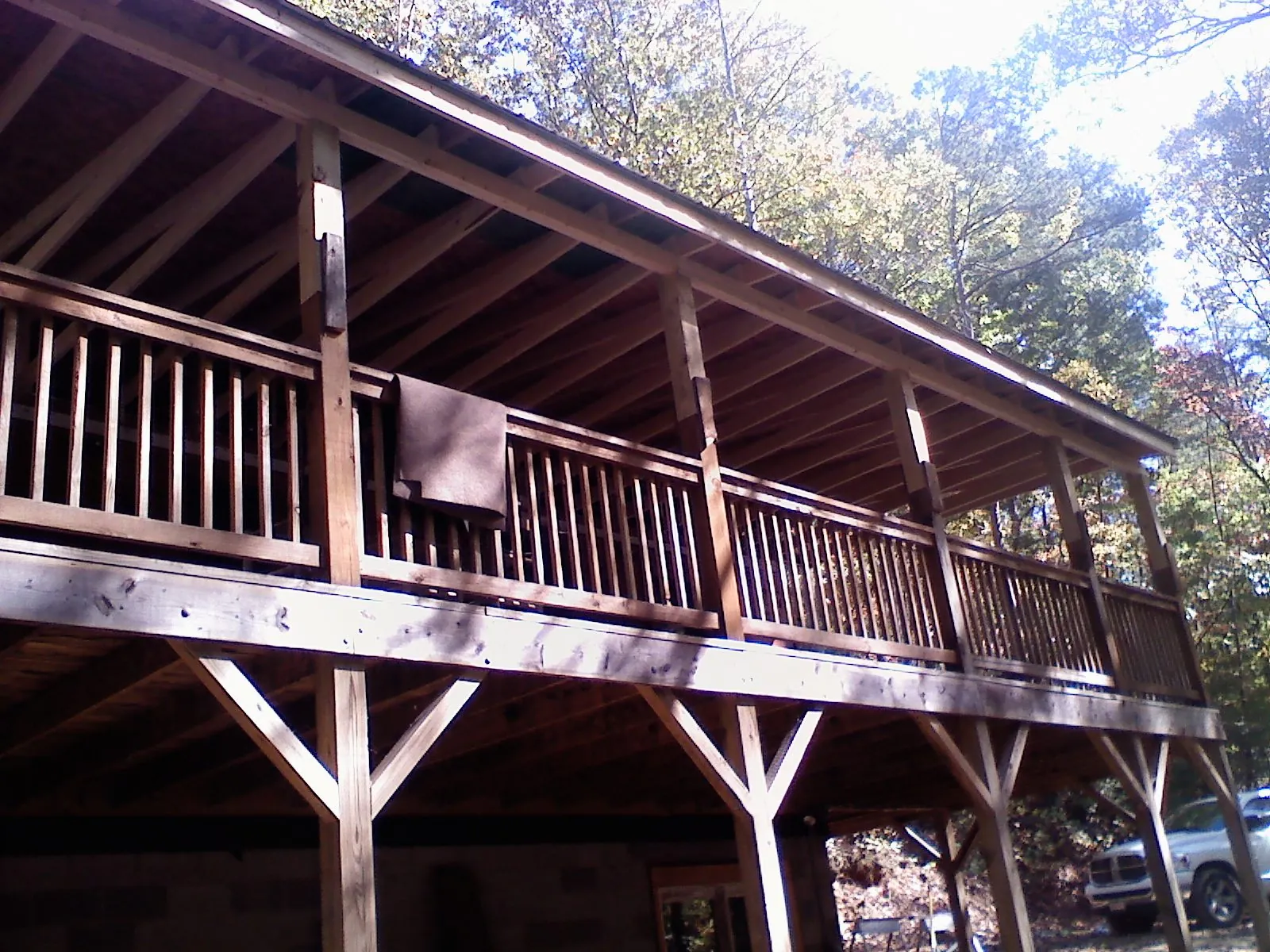 Timber framing under a new elevated porch and deck — Roof Leak Repair in Woburn by Roofing Brothers